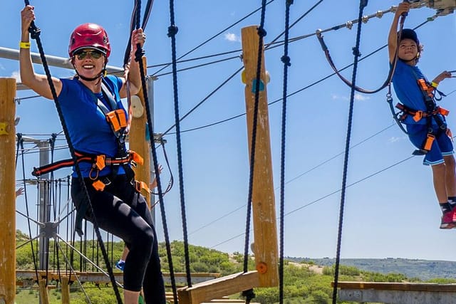 Navigate through obstacles up to 50ft in the air on one of the largest aerial park in Colorado.